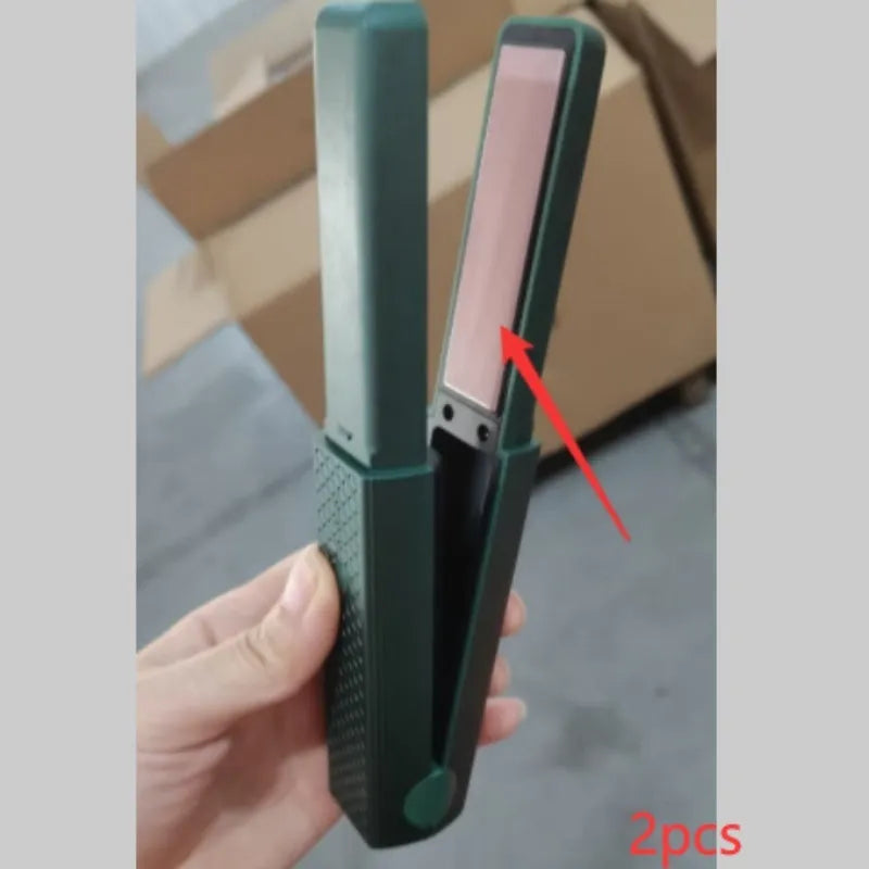 Pink and green cordless USB hair straightener with ceramic plates and digital temperature display.