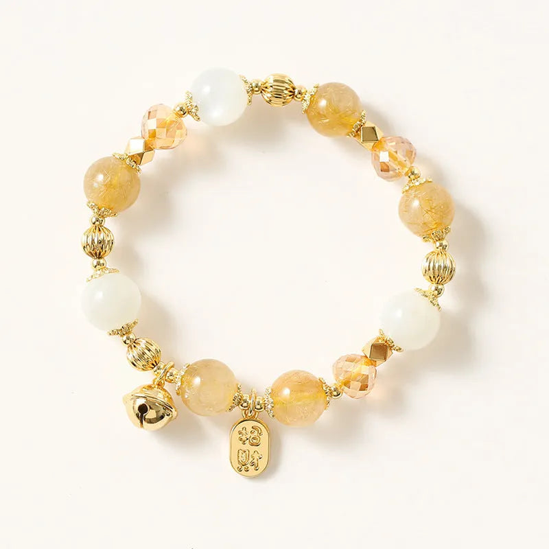 Korean style gold crystal bracelet with rutilated quartz stones and electroplated finish.