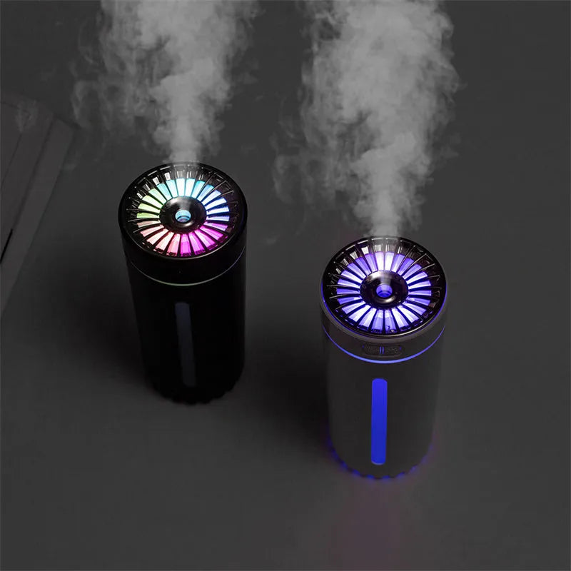 Black portable USB rechargeable humidifier with colourful LED lights on car cup holder