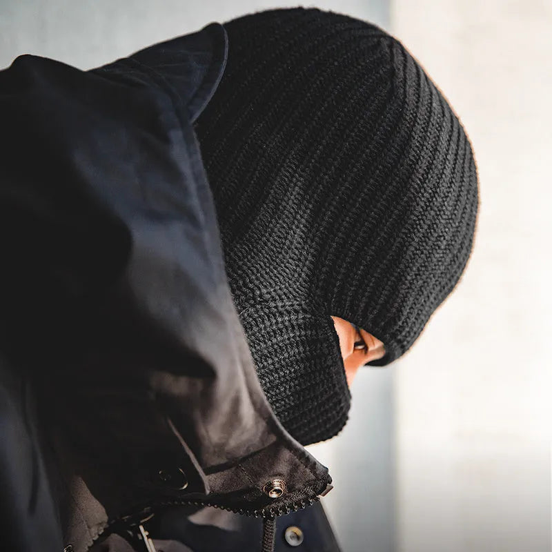 Vintage knitted melon-skin warm beanie in black with street-style patch detail, adjustable size, unisex design.