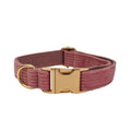 Red corduroy dog collar and leash set with matching vest, bow tie, and poo bag