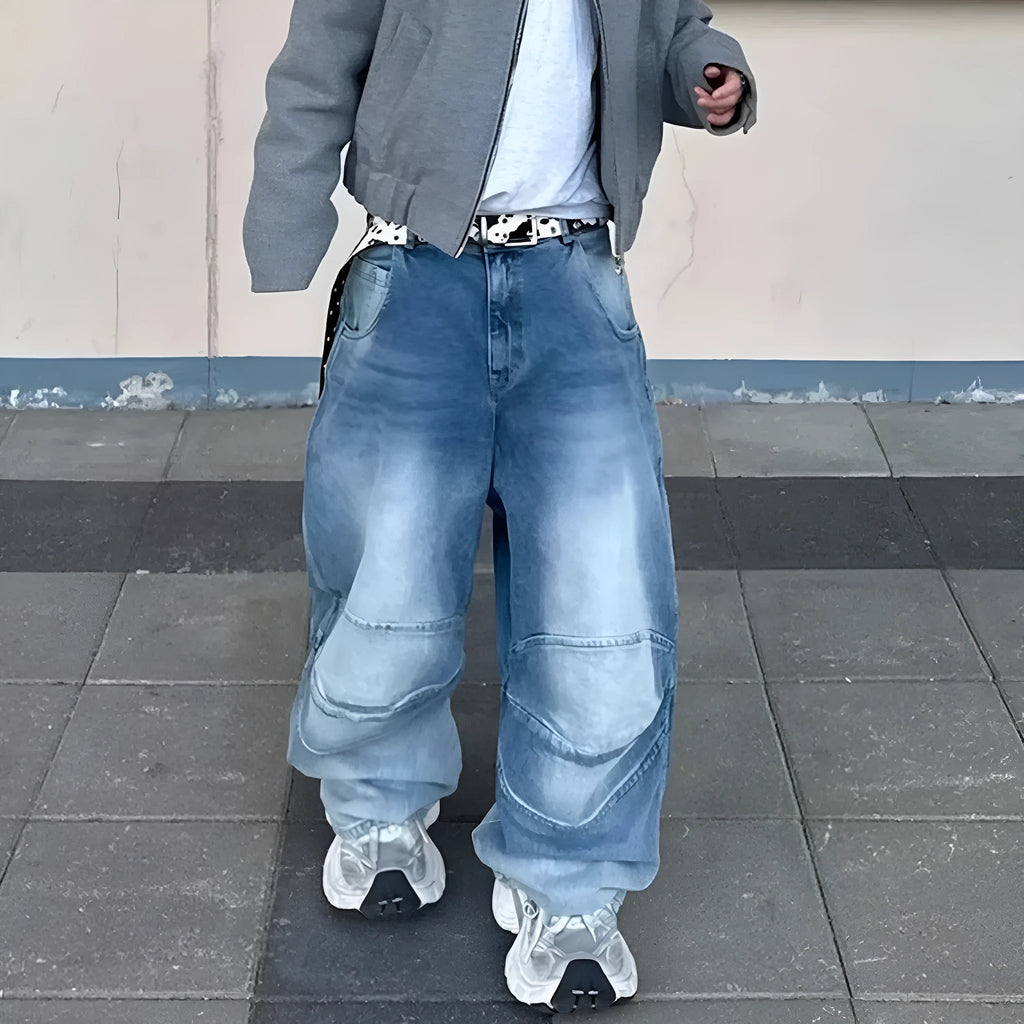 Men's washed blue baggy jeans with pleated front detail and straight-leg cut