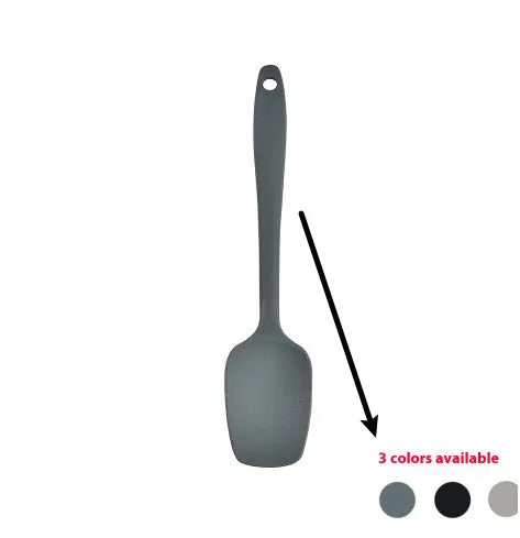Black silicone kitchen utensil set with 12 tools in a rotating storage bucket on a kitchen countertop