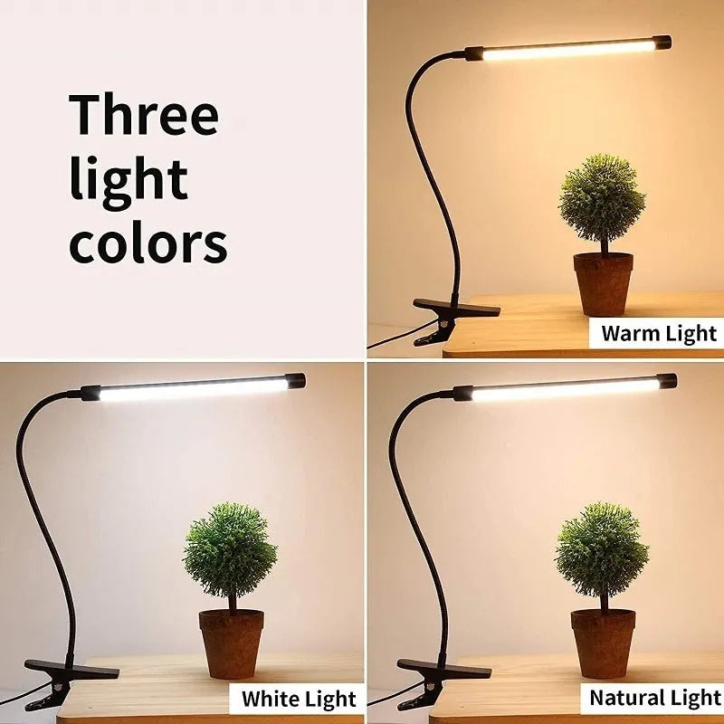 Black and white USB-powered LED desk lamp with a 26 cm length on a desk.