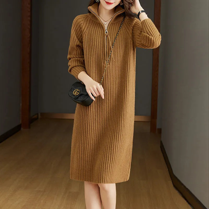 Beige half-zip woollen midi dress with long sleeves and a stand collar, laid flat.
