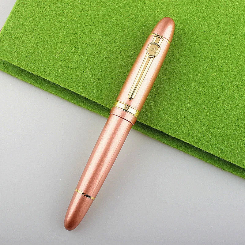 Metal ball pen with pearl round beads and black gold clip on white background