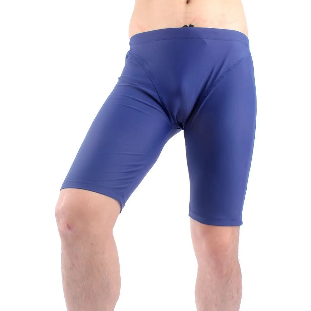 Men's green and navy blue quick-dry swimming trunks with anti-embarrassment lining, loose plus-size fit.