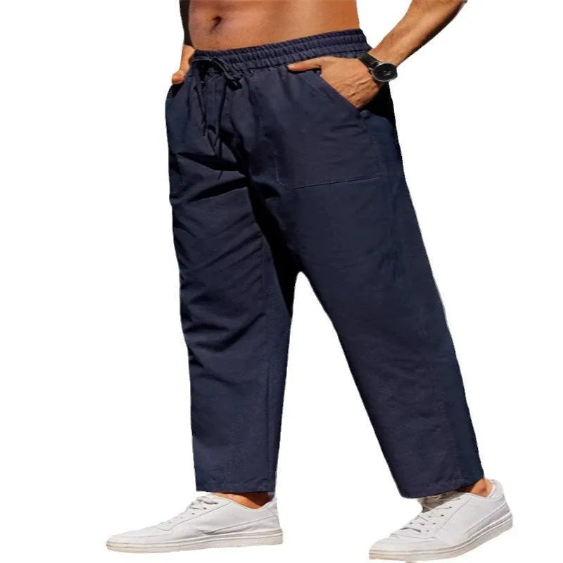 Men's straight-leg linen casual trousers in apricot colour with an elastic waistband