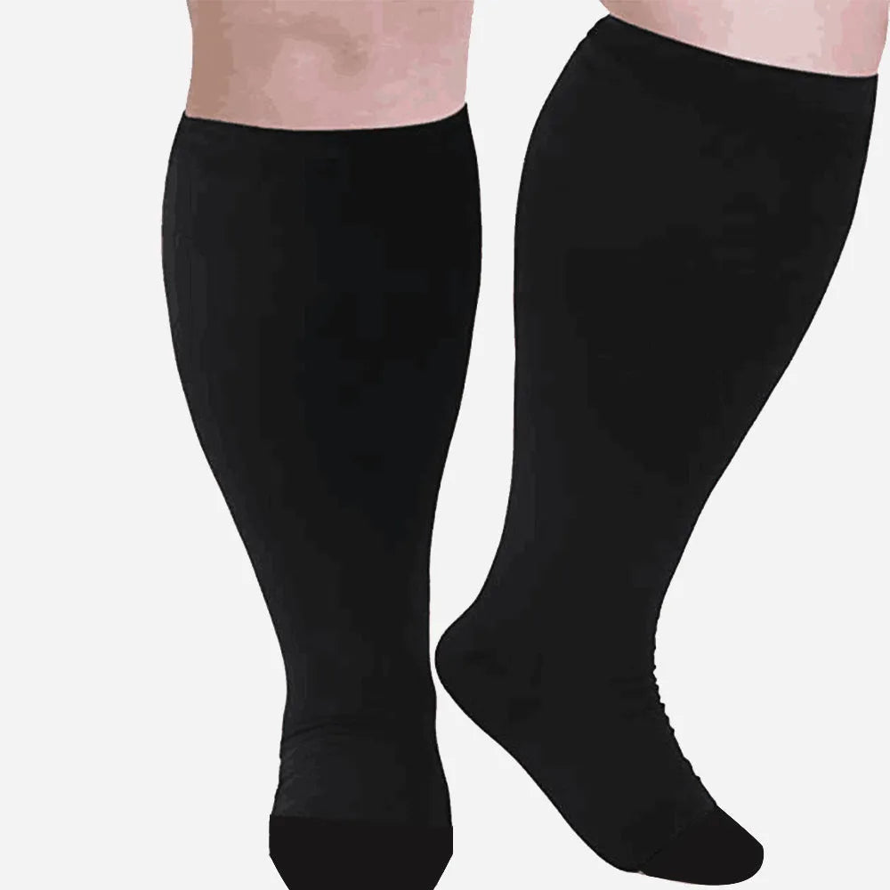 Plus size compression socks for extra wide calf in blue ECG pattern on white background