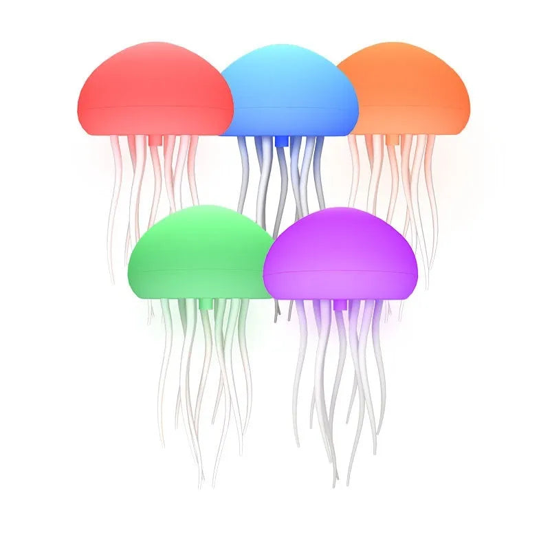 Jellyfish mood lamp with glowing adjustable tentacles on a desk next to a phone.