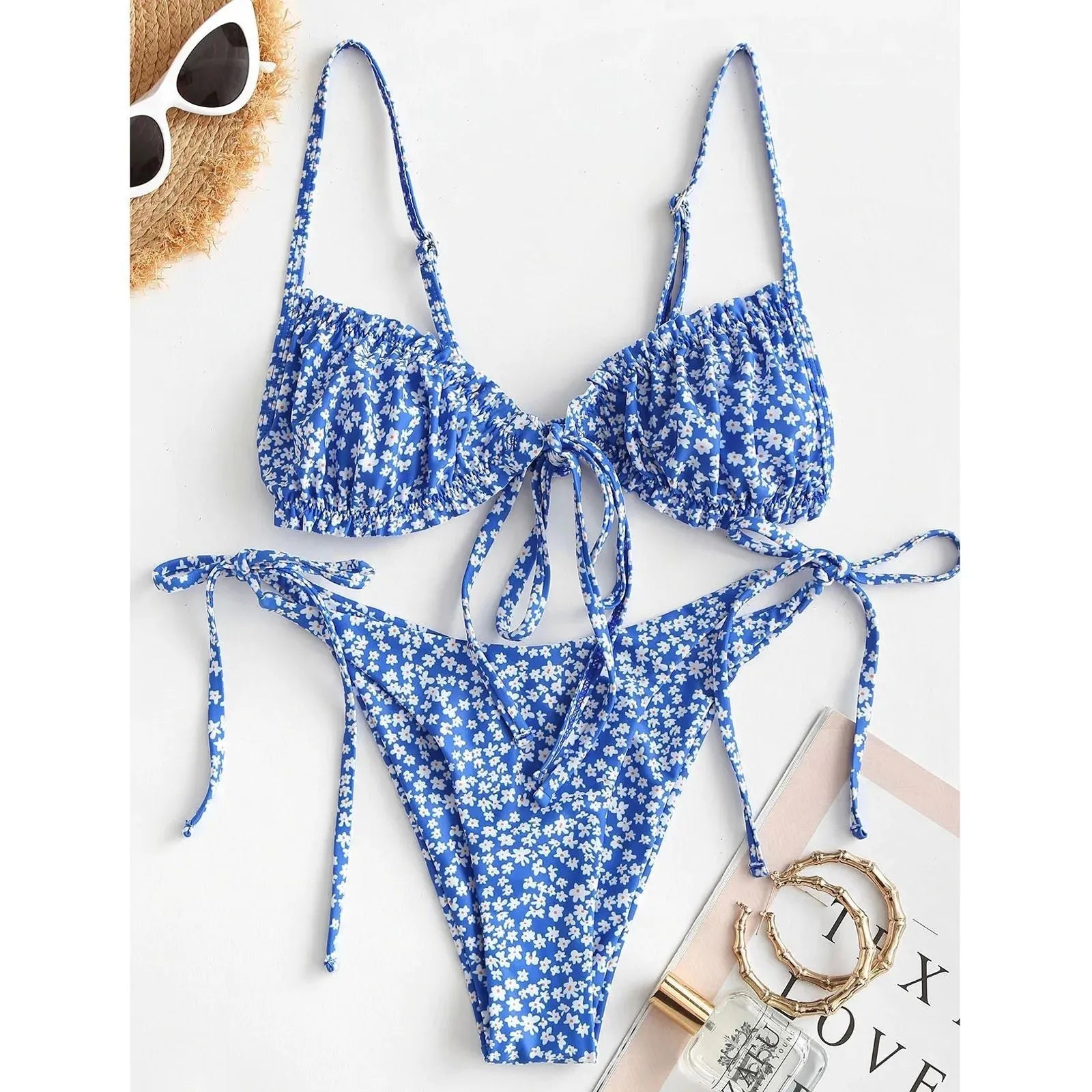 Blue women's pullover bikini swimsuit with printed rope band design and short sleeves