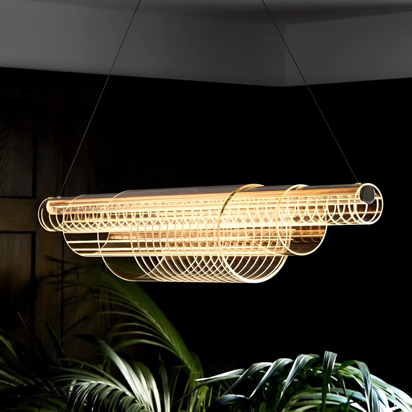 Modern minimalist glass pendant lamp with iron fittings in three length options.