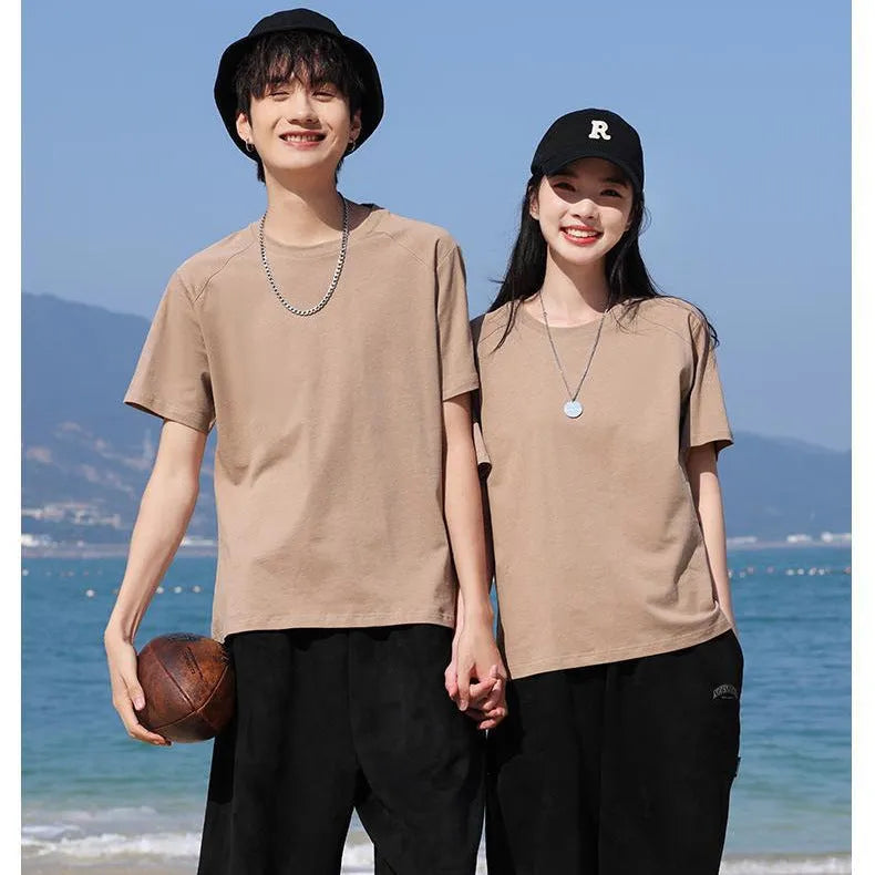 Men's plain pure cotton short sleeve t-shirt on a hanger, shown in multiple solid colours.