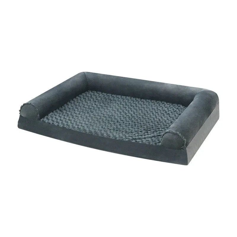 Grey soft-sided dog kennel bed with raised edges, shown in a home setting.