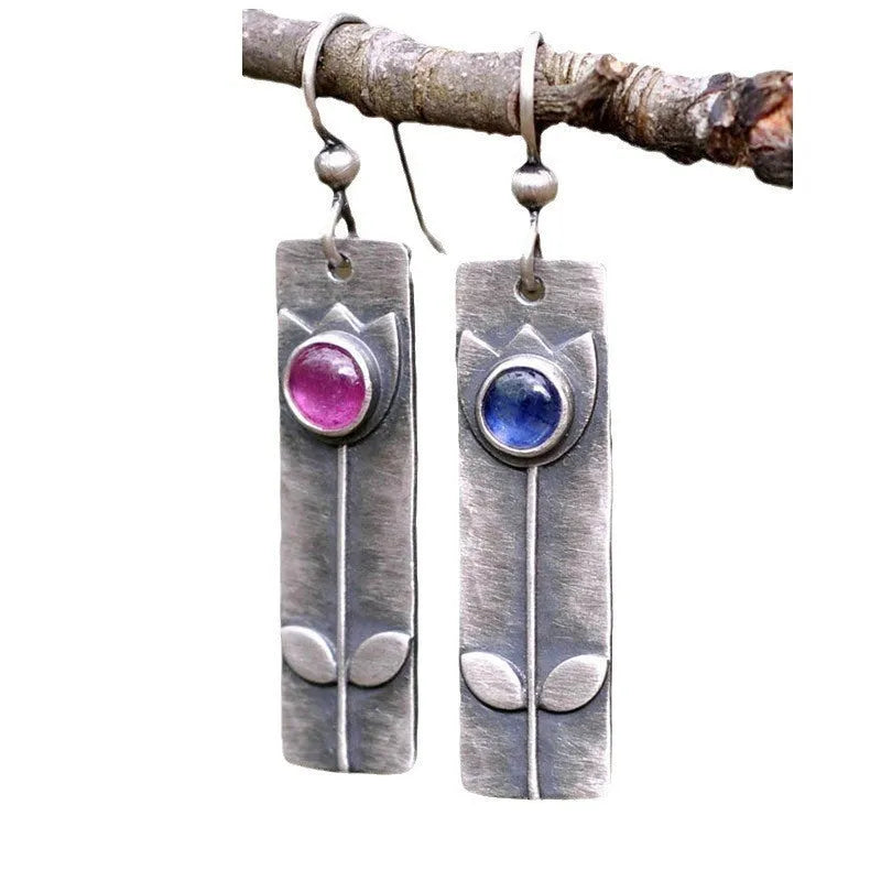 Antique finish red sapphire geometric earrings with retro style and elliptical design elements