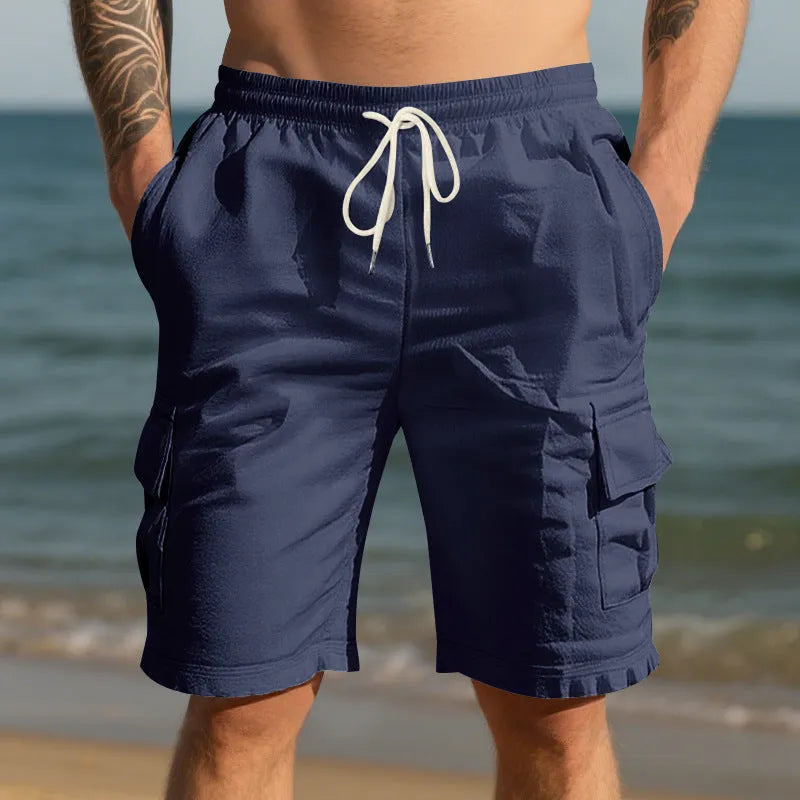 Men's straight-leg linen casual shorts in a light blue colour, showing front view with pockets.