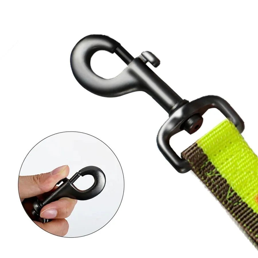 Green tactical dog leash with elastic section and metal clip for medium large breed training