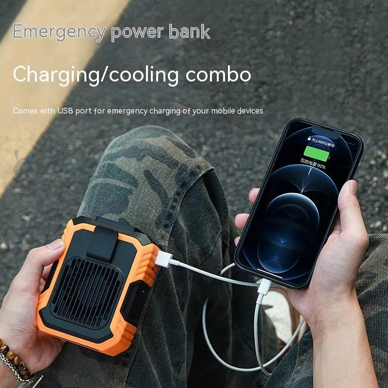 Green wrist-mounted personal fan with integrated USB power bank and light, showing adjustable silicone strap.