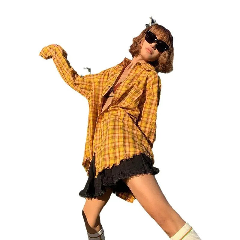 Loose-fit yellow plaid cardigan-style shirt for men and women on a hanger