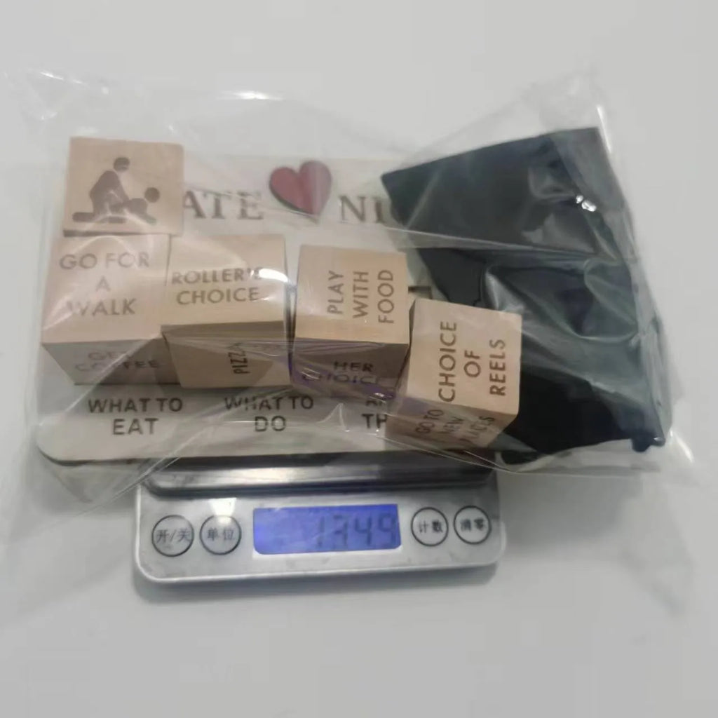 Wooden date night dice set showing five dice, date planner board, and black storage bag for couple's activities