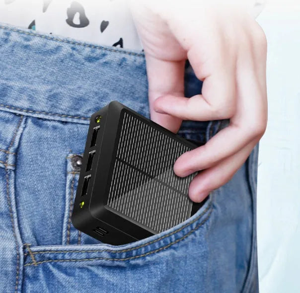 Small portable solar power bank in plastic case, 80x80x28mm, with USB output