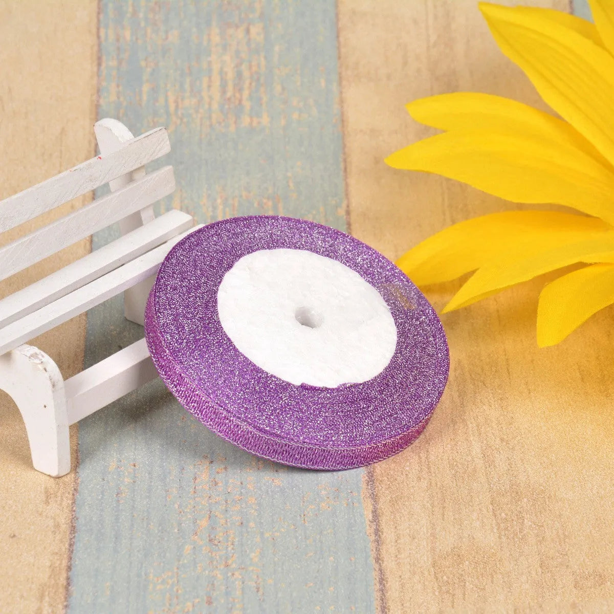 Colourful green onion pattern polyester ribbon spool with metallic gold or silver wire detailing.