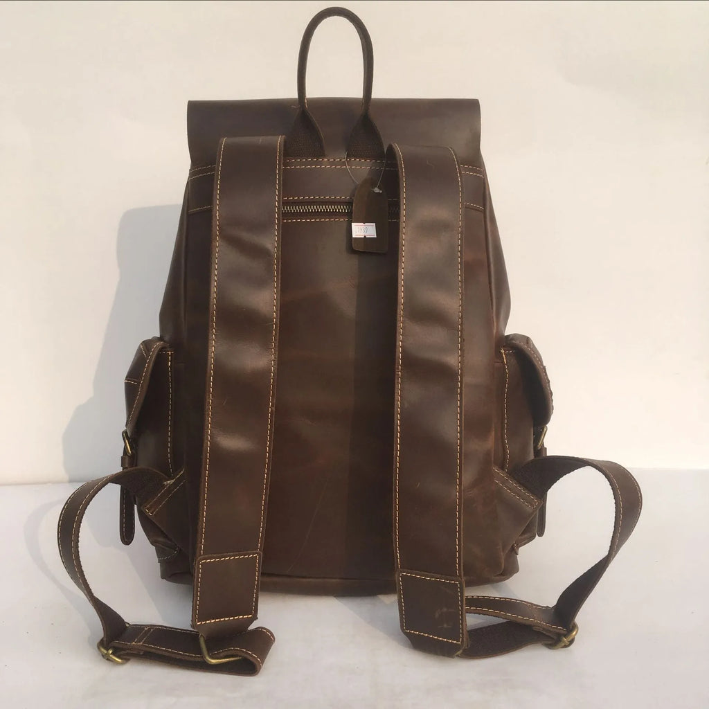 Brown coffee genuine leather men's backpack with air cushion shoulder straps showing first layer cowhide texture