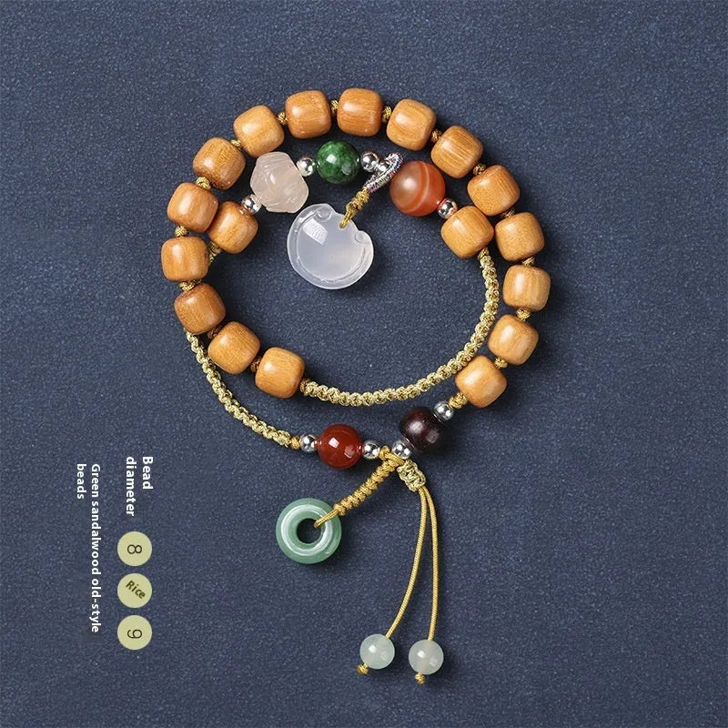 Hand-woven ebony double ring bracelet with traditional jade beads and Ruyi charm elements