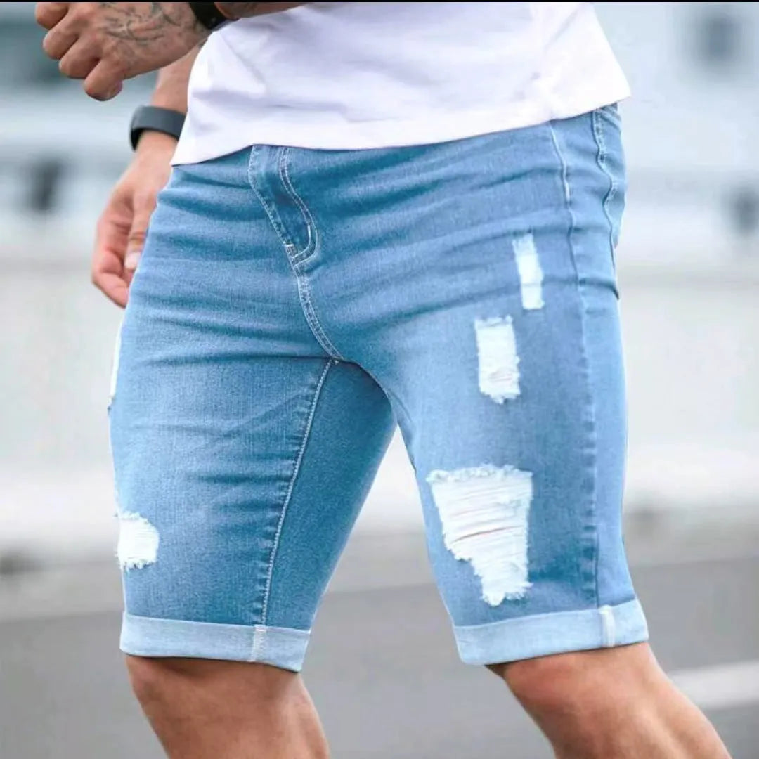 Sky blue men's denim shorts with multi-hole manual wear distressing and low waist straight cut