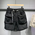 Men's black loose-fitting work shorts with elastic waistband and pockets, laid flat
