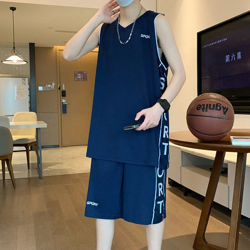 Light grey polyester basketball vest and shorts sports suit laid flat