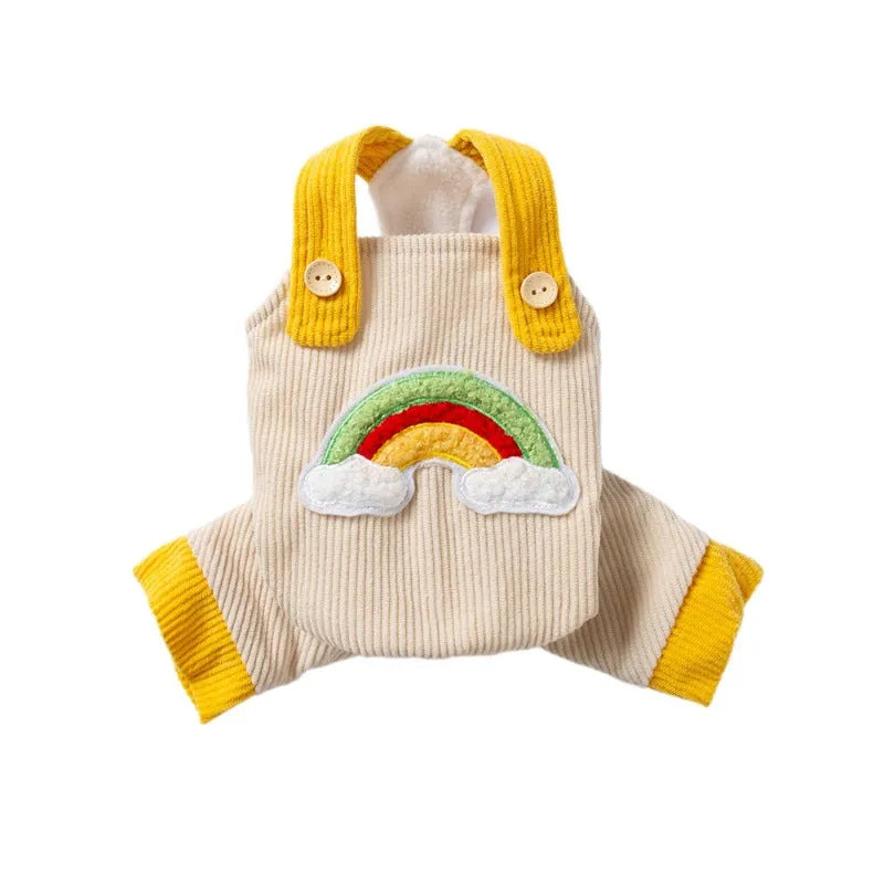Small dog wearing beige corduroy overalls with rainbow print, autumn winter outfit