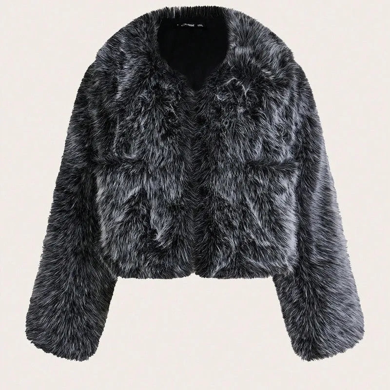 Women's short black and white artificial fur coat with a large fur collar, shown in a cute style pose.