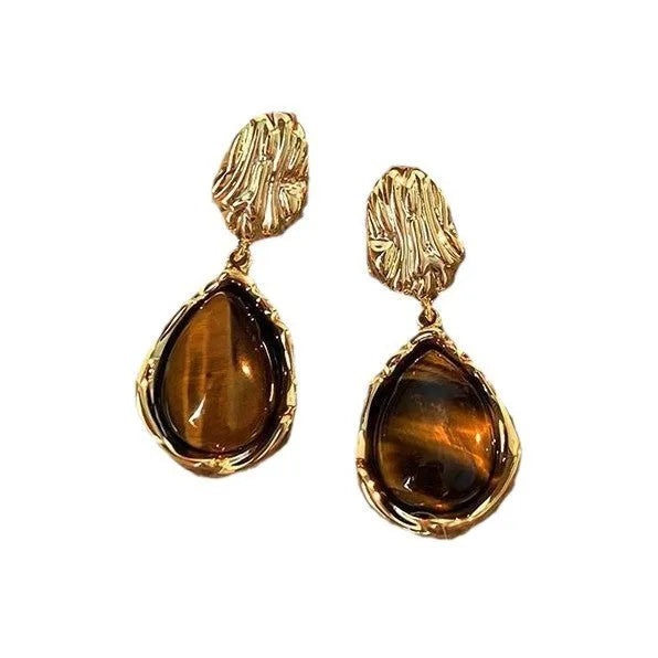 Three pairs of handmade geometric alloy earrings with electroplated finishes and tassel details