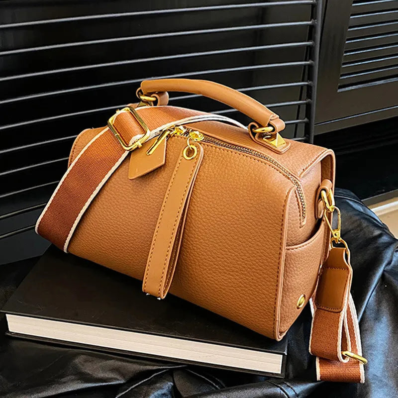 PU leather shoulder messenger bag with outer slit pocket and crossbody strap in black colour
