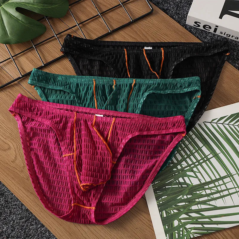 Men's low waist briefs in ice silk lace fabric on a solid background, showing the sports design.