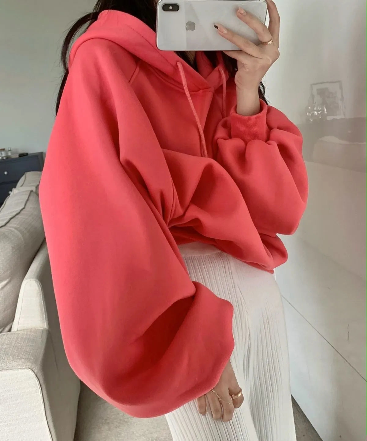 Watermelon red mulberry silk women's hooded sweater in loose pullover style.