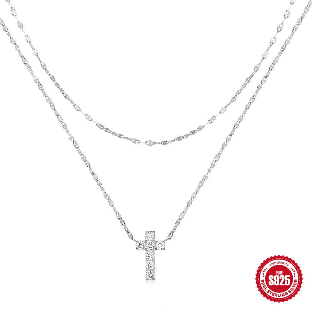 S925 sterling silver double layer twin diamond cross pendant on a gold plated clavicle chain.