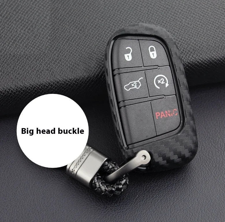 Black silicone key case for Dodge Chrysler Fiat remote, shown with and without a large plastic attachment buckle.