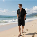 Men's linen short sleeve shirt and shorts beach suit set in a light blue colour.