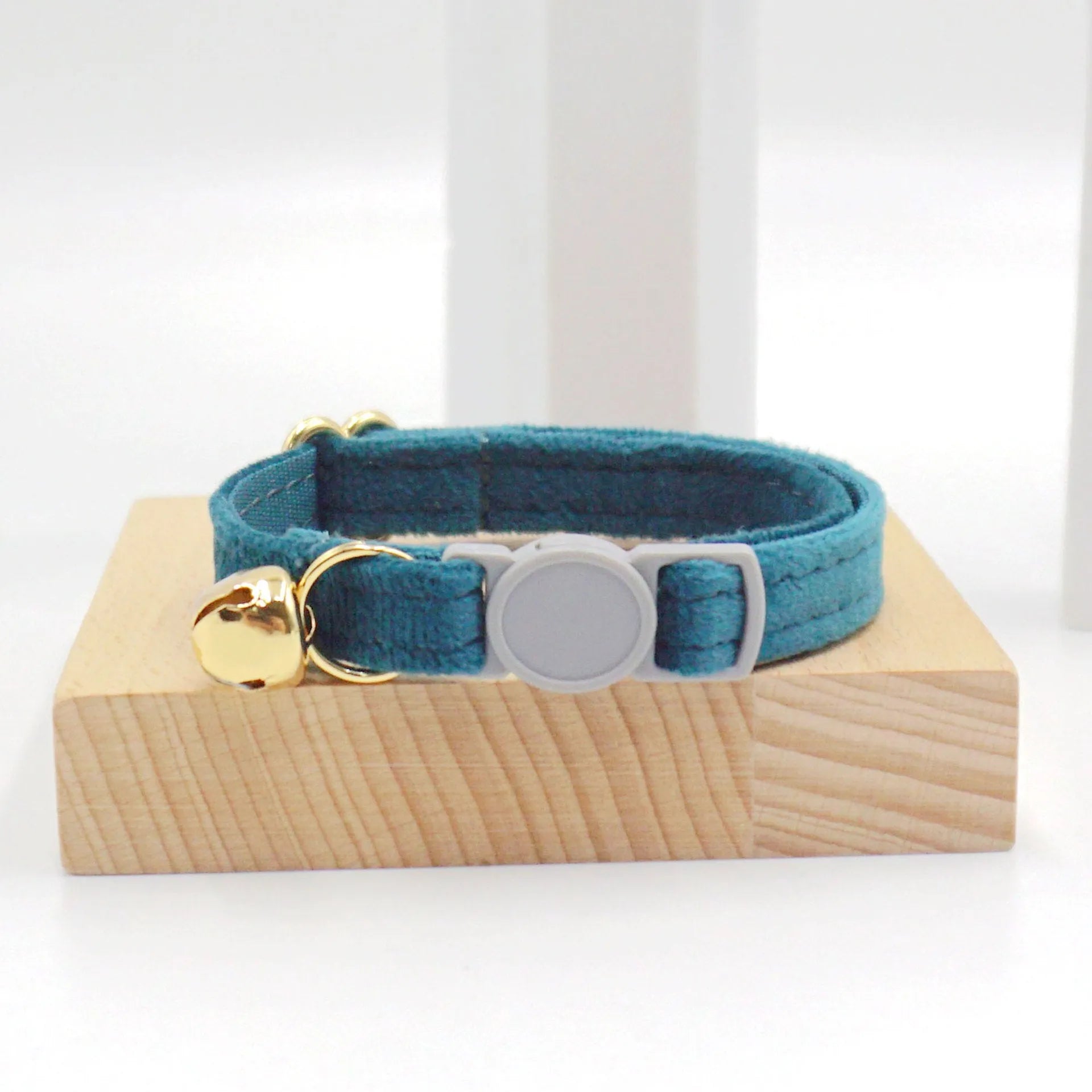 Cat collar with safety buckle and bell, available in corduroy or velvet, in multiple colours for small cats.