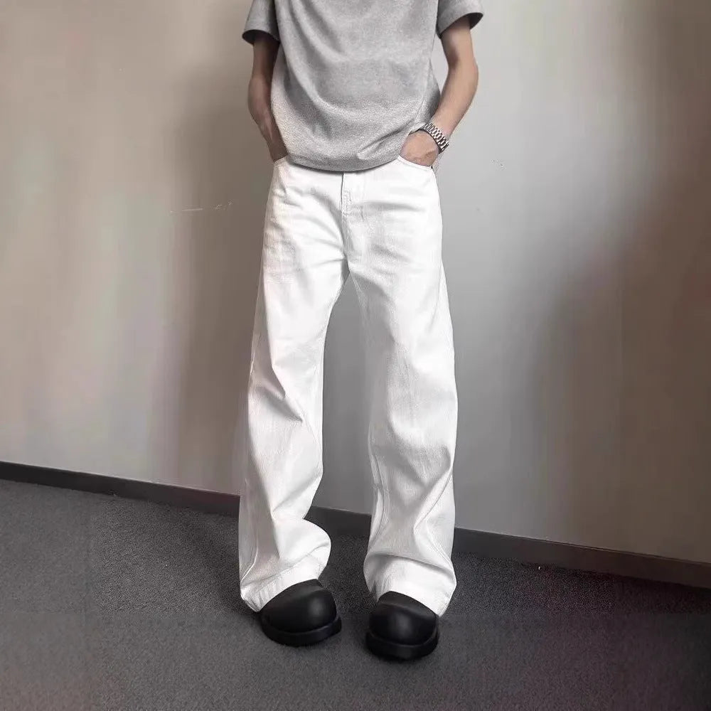 Men's straight wide-leg loose fit white denim jeans on a mid waist.