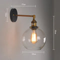 20cm diameter retro spherical glass wall lamp in amber, smoky grey, or transparent with aluminium holder.
