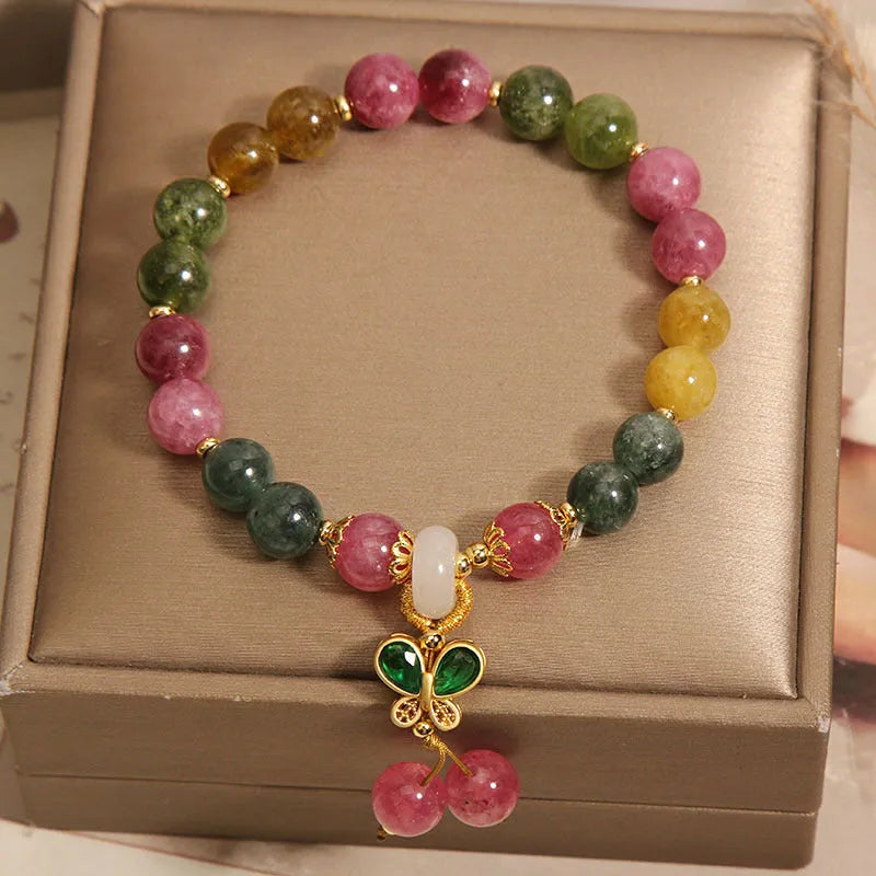Women's tourmaline butterfly pendant bracelet with natural jade colour stones and rhinestone accents