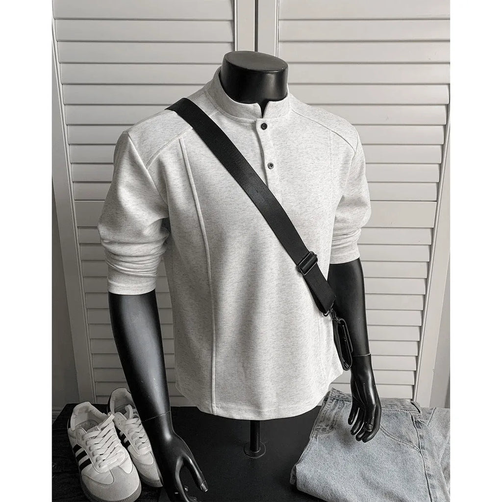 Men's loose-fitting patchwork stand-up collar long sleeve polo shirt in heather gray.
