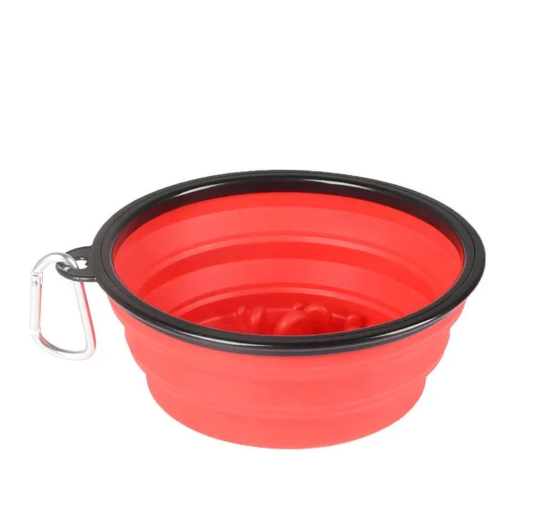 Foldable pet slow food bowl in blue with collar buckle on outdoor grass