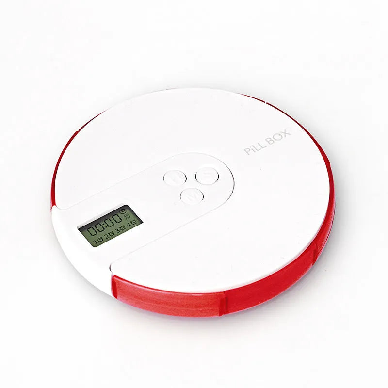 Blue seven-day alarm clock pill dispenser with digital display, showing daily compartments and measuring 11cm wide.