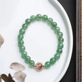 Green strawberry quartz single circle ball bracelet with 7.5mm beads and hand-woven construction