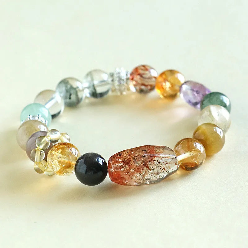 Adjustable black and gold crystal bead bracelet with natural multi-coloured stones on gold-finished settings