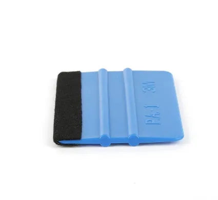 Blue automotive film scraper made from PP plastic, measuring 125x80mm, designed for car decal removal